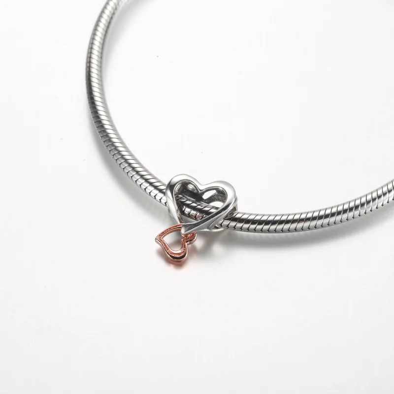 (obrázek pro) Pandora Dvoubarevný Charm s otevřeným vzorem nekonečného srdce - 782642C00 - Zobrazit 5